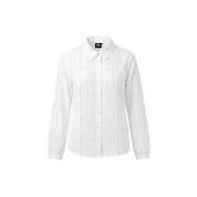 A loose-fitting, hip-length blouse with graphic lace details. Features a collar and button closure.