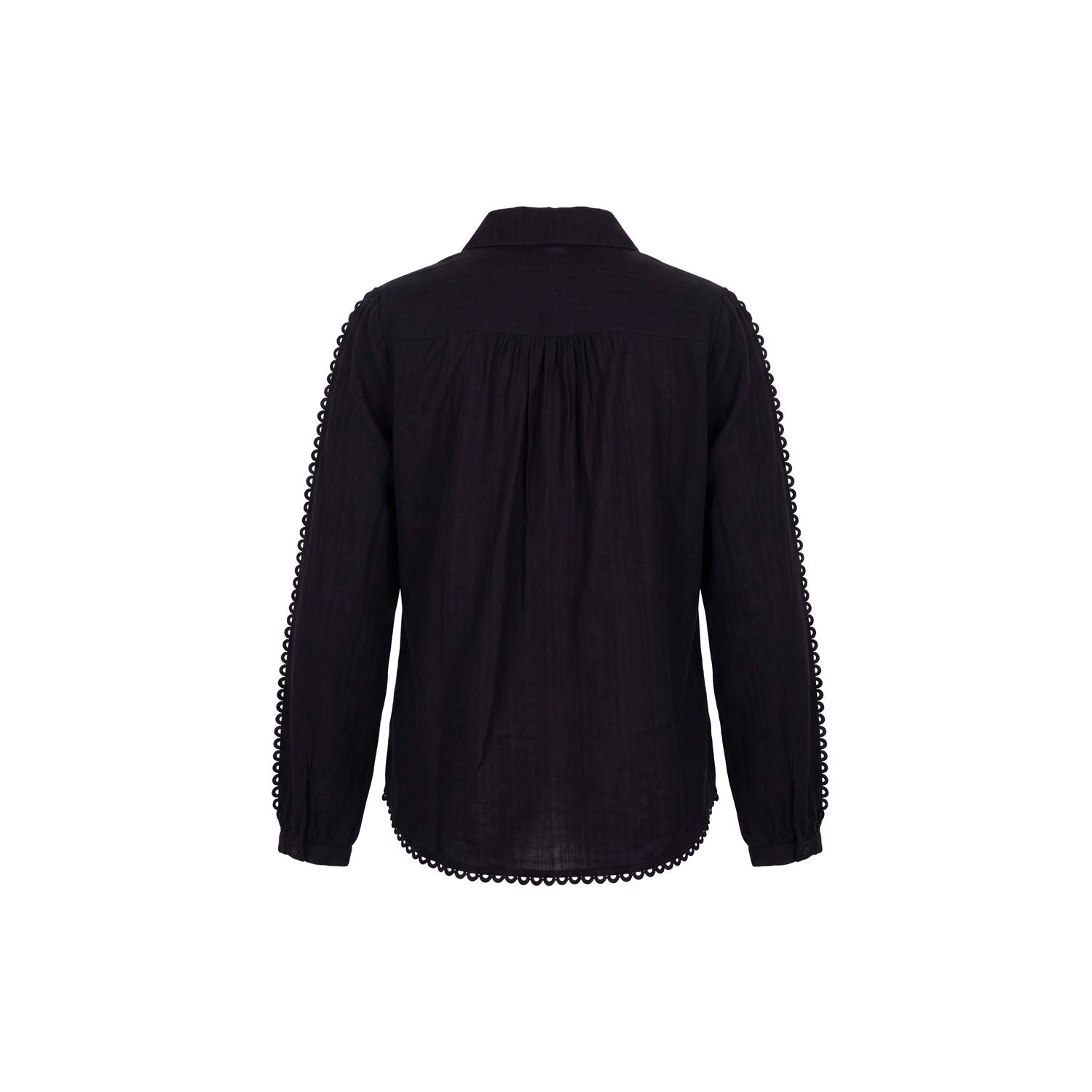 A loose-fitting, hip-length blouse with graphic lace details. Features a collar and button closure.